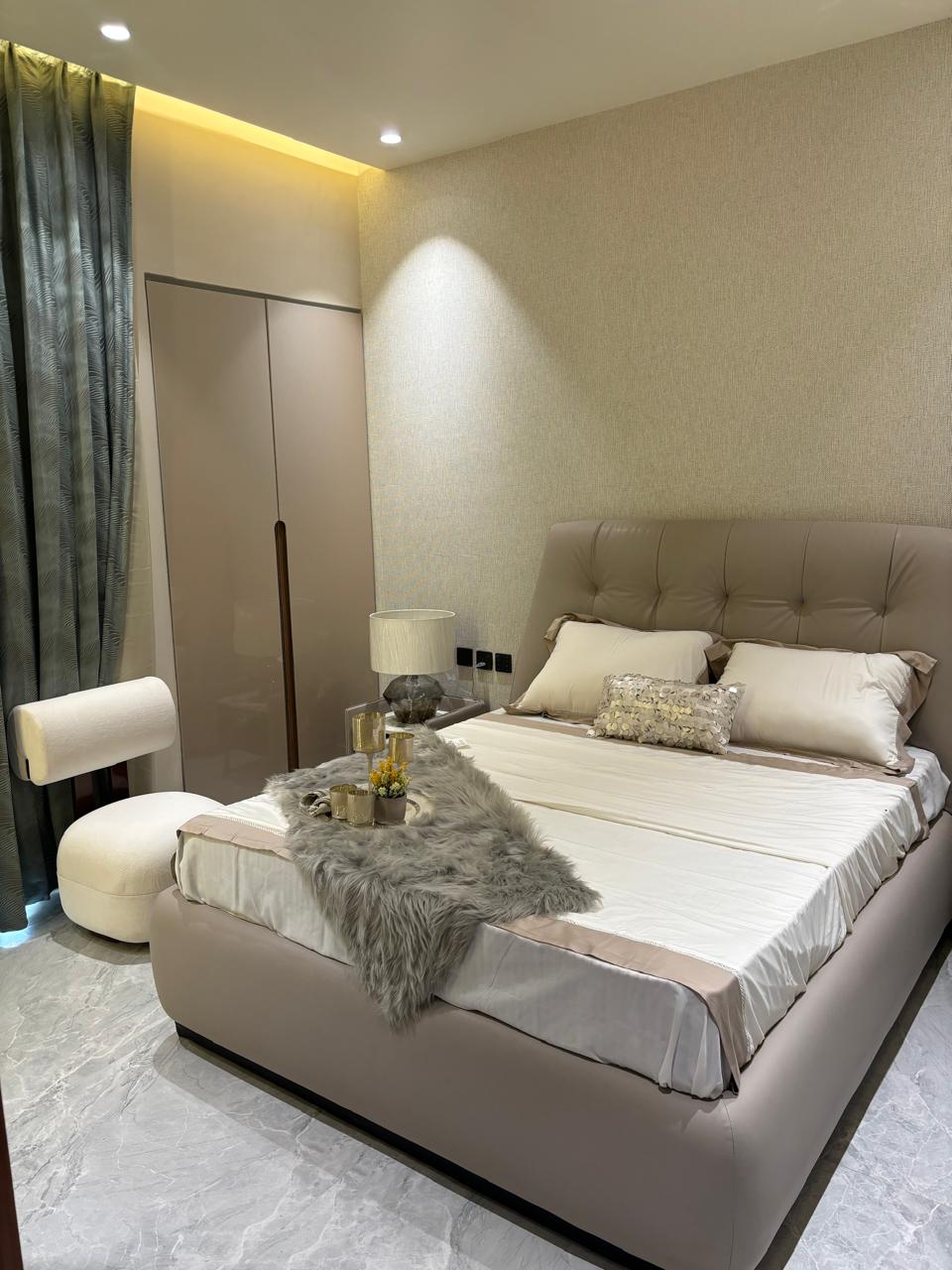 Modern bedroom with elegant decor Hare Krishna Ashiyana