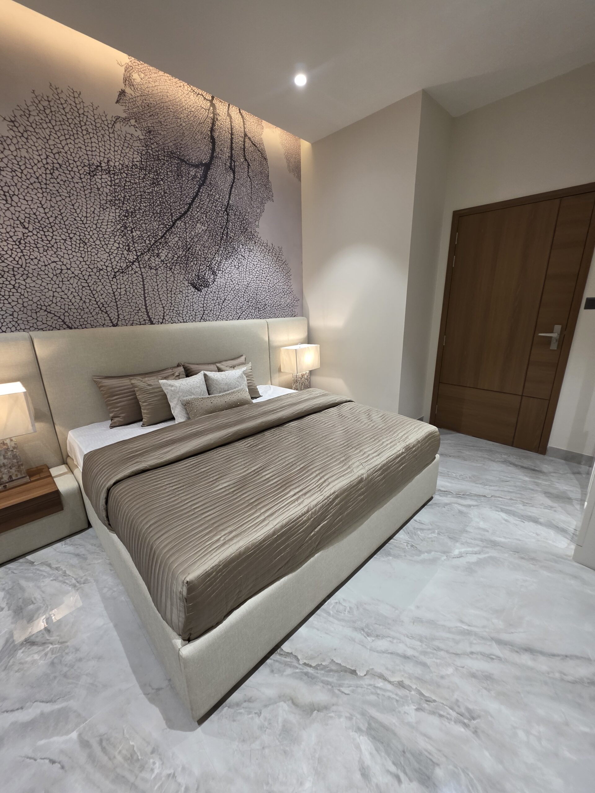 “Comfortable 3rd bedroom at Hare Krishna Ashiyana in Vrindavan with modern design, natural light, and cozy ambiance”